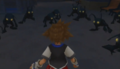 Sora surrounded by Heartless in Traverse Town.