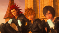 Roxas, Axel, and Xion relaxing on the clock tower in the opening scene.