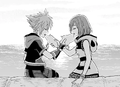 Sora and Kairi sharing paopu fruit in the Kingdom Hearts III manga.