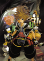 Sora, Donald, Goofy, and the Beast, in a color illustration from the first volume of the Kingdom Hearts II manga (Yen Press release).