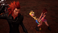 Lea and Kairi battling together in the Keyblade Graveyard.