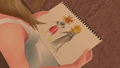 Naminé holding a drawing of Sora and Roxas.
