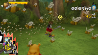 A screenshot of Sora battling several groups of Honey Bees
